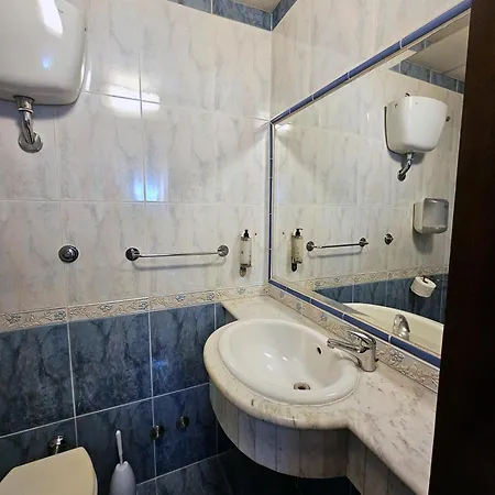 Check In Πανσιόν